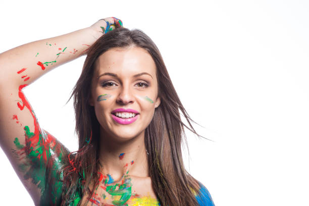 istock Close up of brunette model covered in liquid paint 860295006