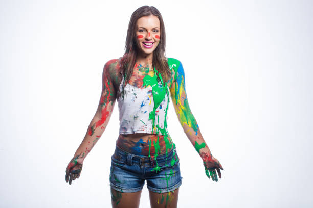 istock Close up of brunette model covered in liquid paint 860295312