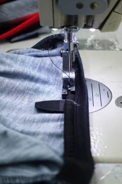 istock Sewing needle of sewing machine making stitches 860295552