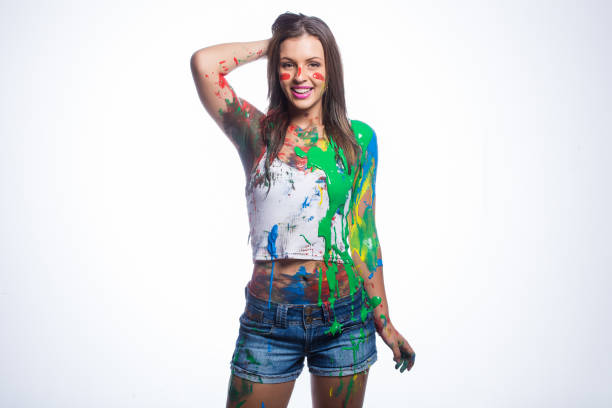 istock Close up of brunette model covered in liquid paint 860295596