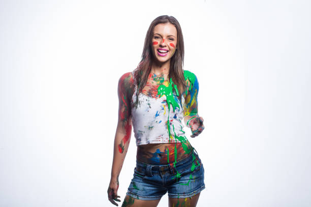 istock Close up of brunette model covered in liquid paint 860295598