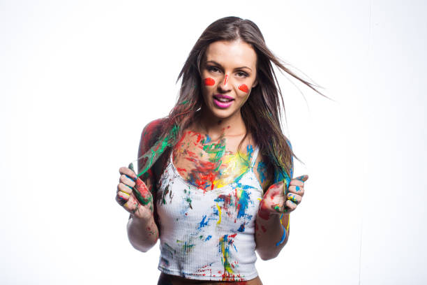 istock Close up of brunette model covered in liquid paint 860295606