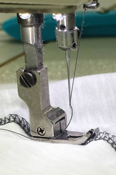 istock Sewing needle of sewing machine making stitches 860295866