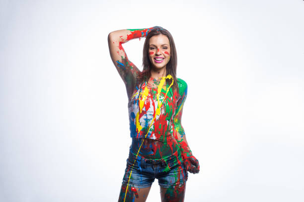 istock Close up of brunette model covered in liquid paint 860295888