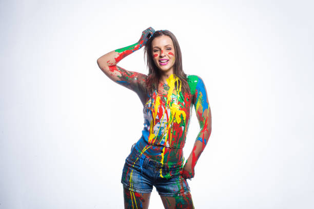 istock Close up of brunette model covered in liquid paint 860296132