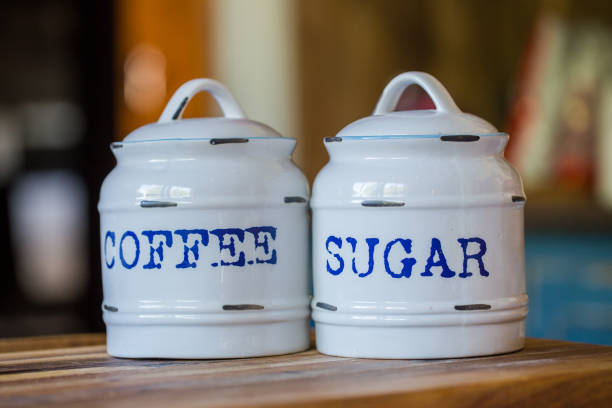 Close up view of Coffee and Sugar pots on a table in a kitchen