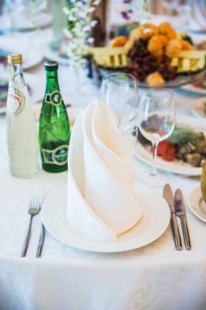 istock table serving with dishes and flowers in hall 860298388