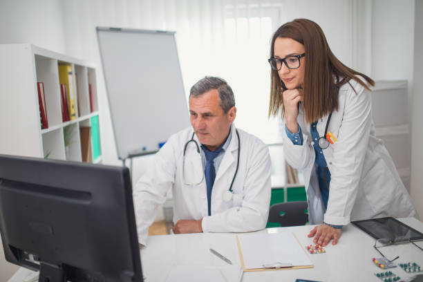istock Doctor and beautiful assistant 860303000