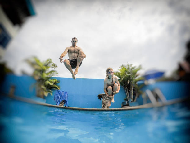 istock Cannonball kid and dad 860313644