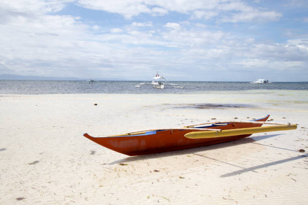 istock A beached traditional boat in Bohol, philippines 860321590