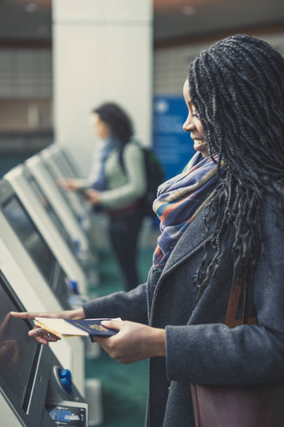 istock Young ethnic woman at airport 860322328