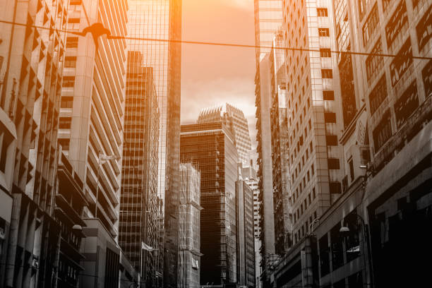 istock Modern office building close up in sunlight with B&W color 860352010