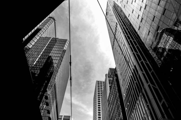 istock Modern office building close up in sunlight with B&W color 860352064