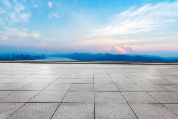 istock empty marble floor with modern city and long river 860363534