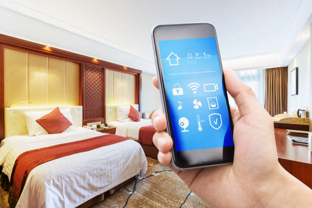 istock smart phone with modern twin bed room 860366652
