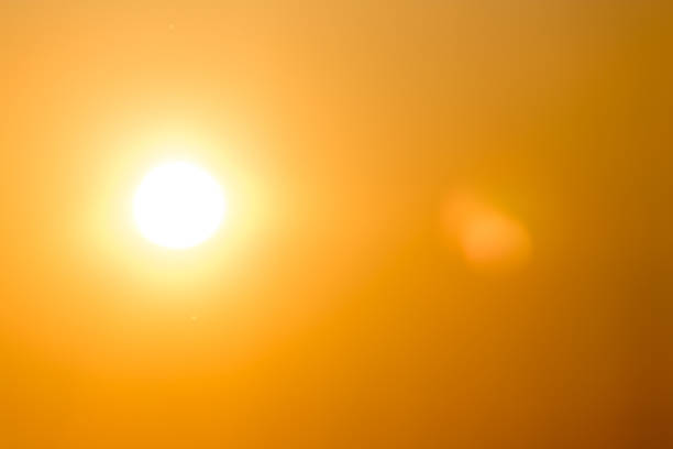 istock sun in the sky at sunset 860376858