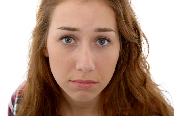 Portrait Of Beautiful Young Woman Over White Background