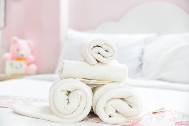 istock White towels on bed in the bedroom. 860378758