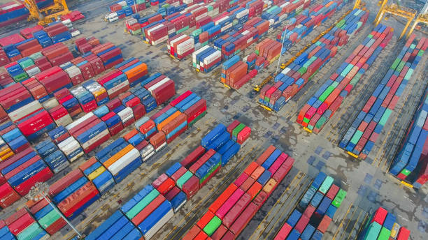 istock Logistics and transportation of Container Cargo ship and Cargo working crane bridge in shipyard 860384700