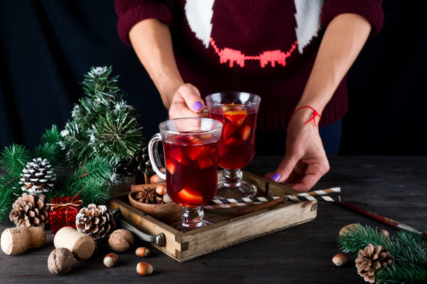 istock in female hands tray with hot mulled wine 860387702