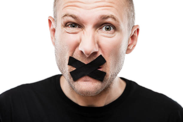 Scared adult man adhesive tape closed mouth stock photo