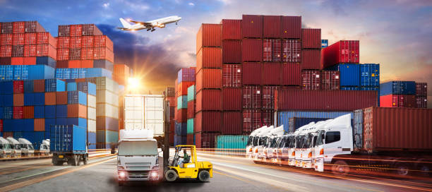 istock Logistics and transportation of Container Cargo ship and Cargo plane with working crane bridge in shipyard 860393250