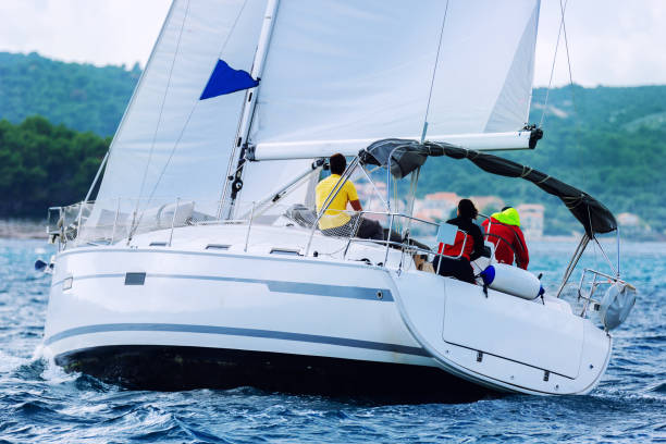 istock Sailing crew on sailboat 860396058