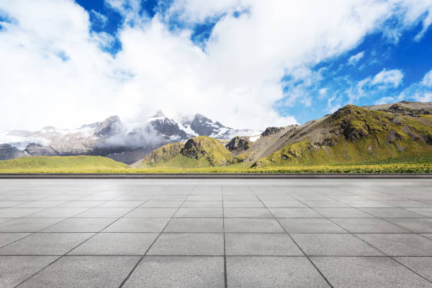 istock empty marble floor with beautiful snow mountains 860396756