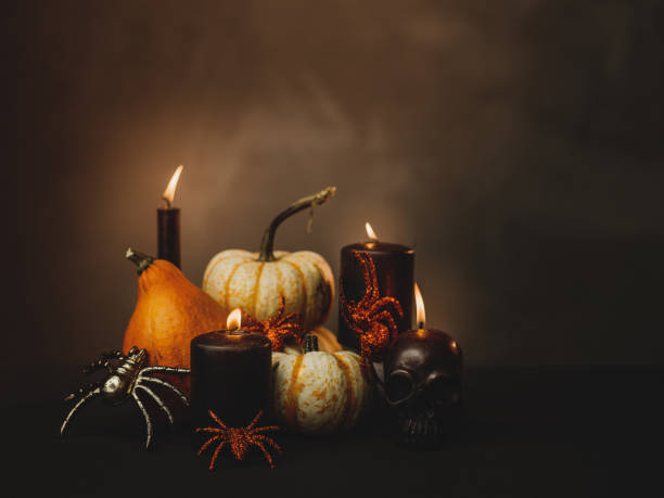 istock Halloween still life decorations with pumpkins and candles 860399186