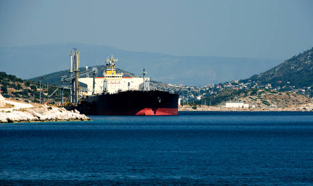 Old industrial ship in the port of Athens in the sunrise, Greece