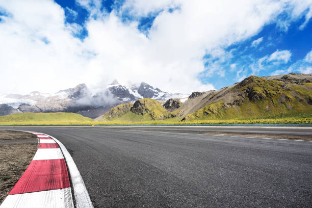 istock empty asphalt road with beautiful snow mountain 860407818