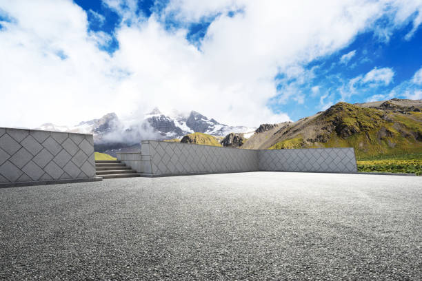 istock empty asphalt road with beautiful snow mountain 860410886