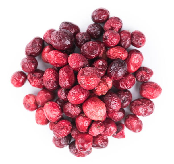 istock Dried Cranberries isolated on white background (selective focus; close-up shot) 860411062
