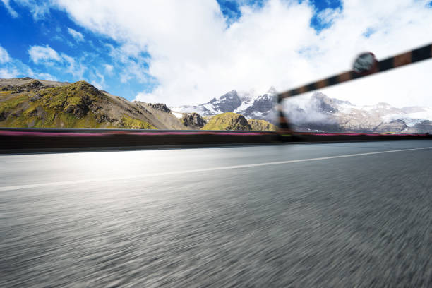 istock empty asphalt road with beautiful snow mountain 860413086