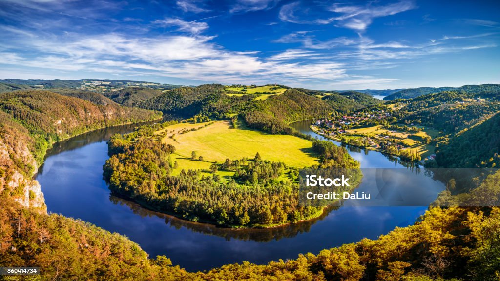River canyon with dark water and autumn colorful forest. Horseshoe bend, Vltava river, Czech republic. Beautiful landscape with river. Solenice lookout. Czech Republic Stock Photo