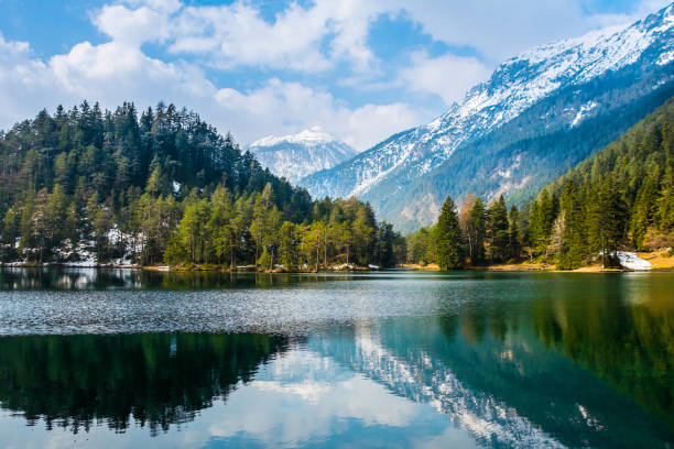 fantastic views of the tranquil lake with amazing reflection. mountains & glacier in the background. peaceful & picturesque landscape. location: austria, europe. artistic picture. beauty world - switzerland lake mountain landscape imagens e fotografias de stock