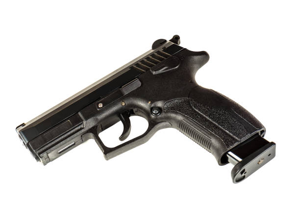 istock The black gun (pistol) on a white background close up. Isolate. 860423572