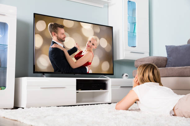 Woman Watching Movie On Television