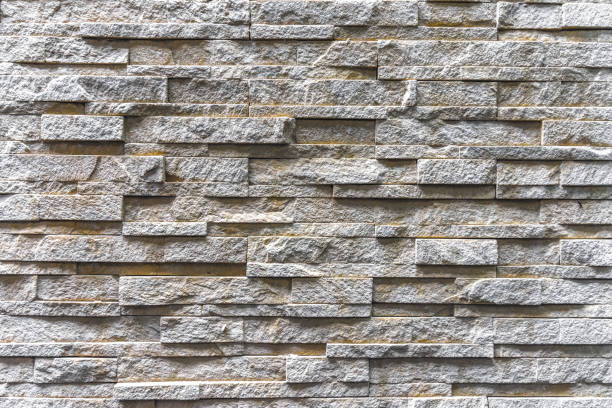 istock light gray and aged paint white brick wall background in rural room 860435358
