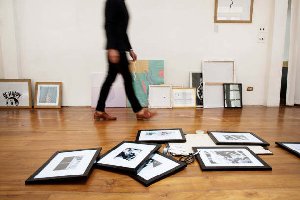 istock Photo frames on wooden floor 860436526