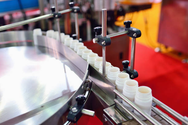 istock Medicine Bottle Filling Assembly Line 860436690