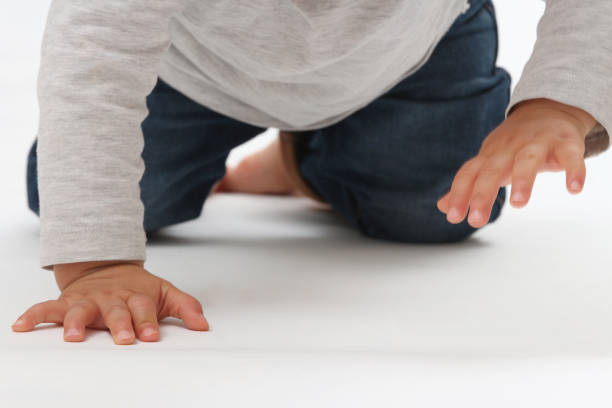 istock hands of a child walking 860442986
