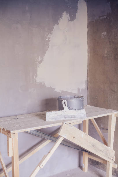 istock Set of plaster trowel tool, spatula and bucket. 860443956