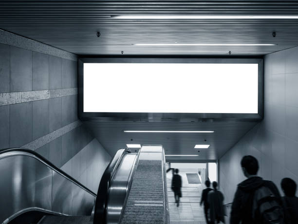 istock Mock up Banner in subway with escalator people walking Public building 860447378
