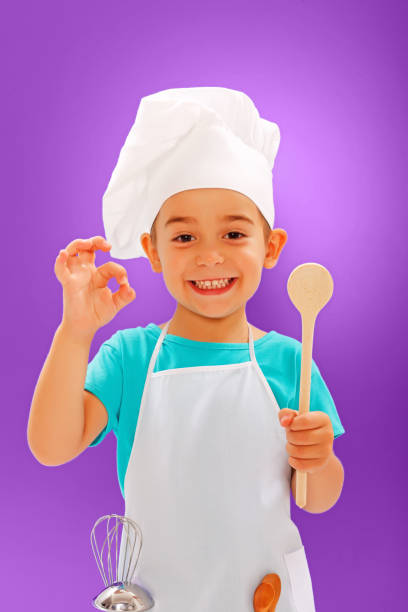 istock Cheerful little chef showing good taste 860447678