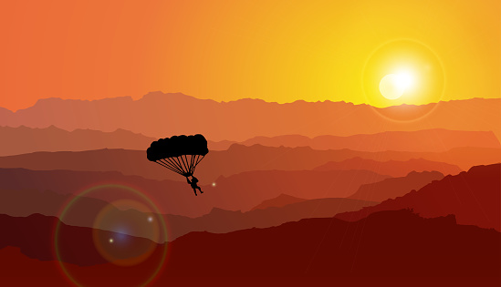 Parachuting Under Sunset