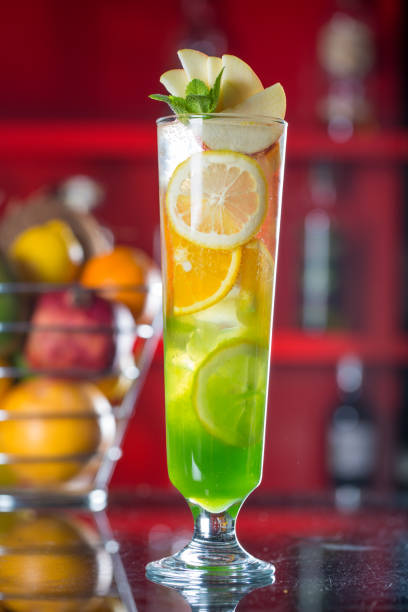 Fresh cocktail juice made of oranges and other summer fruits