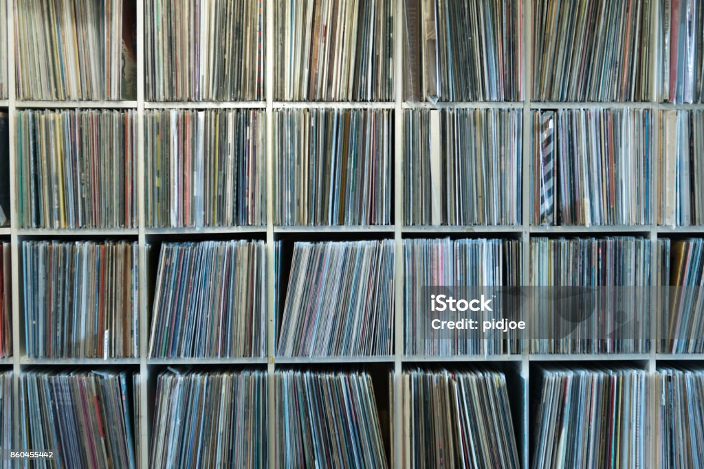 Very large Record rack, collection. Collection of vinyl records on shelves Record - Analog Audio Stock Photo