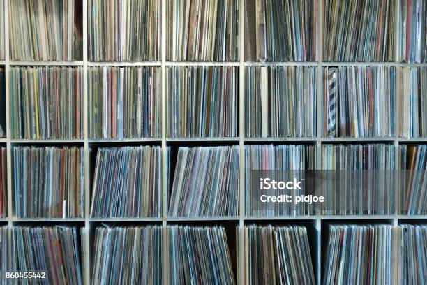 Very Large Record Rack Collection Collection Of Vinyl Records On Shelves Stock Photo - Download Image Now