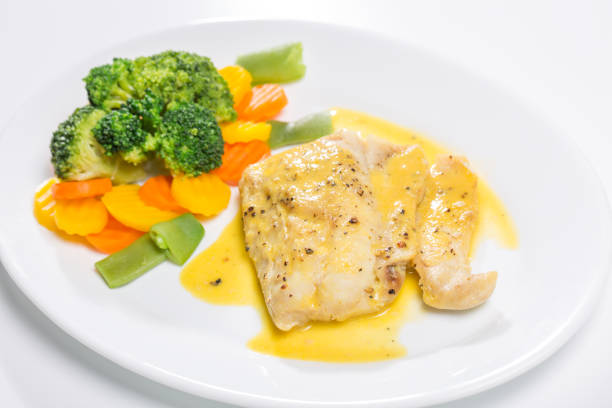 istock Grilled fish fillet with boiled vegetables 860459068